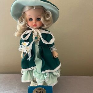 Vintage Doll in Green Dress and Hat